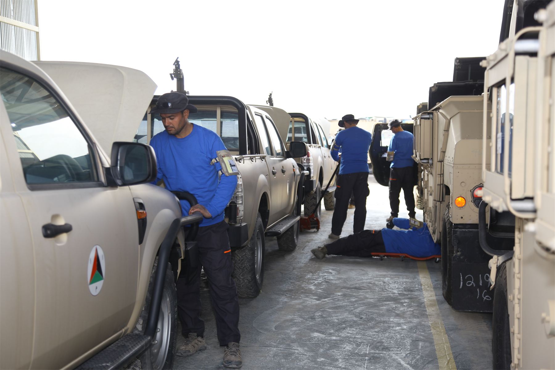 Technicians performing fleet maintenance