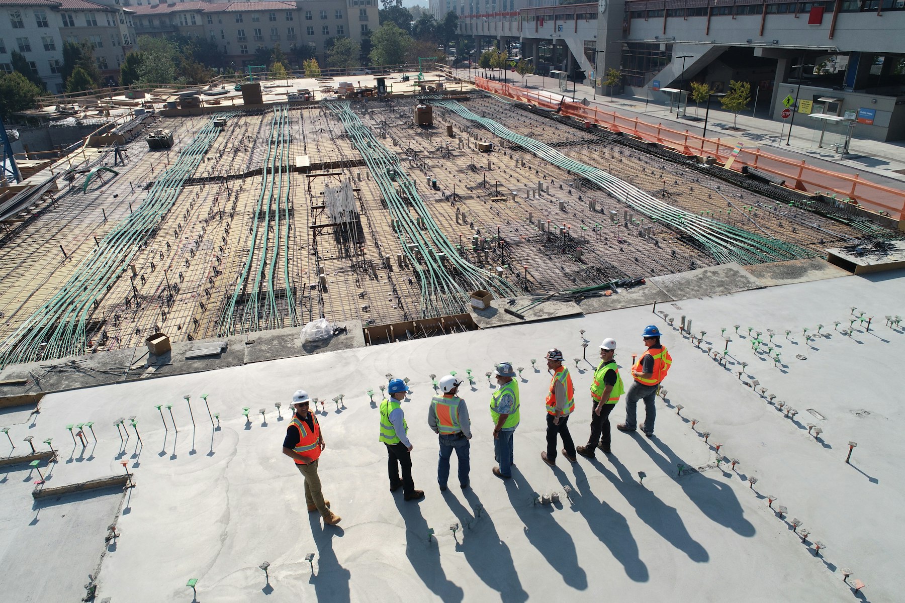 Engineers reviewing plans on an industrial site